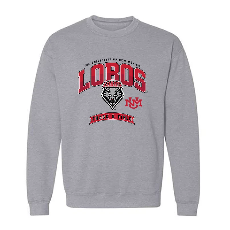 New Mexico - NCAA Women's Track & Field : Laylah Lawson - Classic Fashion Shersey Crewneck Sweatshirt Hoodie with Hem Raw Edge Edgy Unfinished New Mexico - NCAA Women's Track & Field : Laylah Lawson - Classic Fashion Shersey Crewneck Sweatshirt Hoodie with Hem Raw Edge Edgy Unfinished