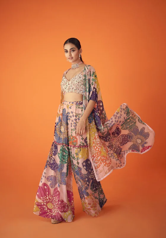 Peach Printed Organza Cape Paired With Sharara Pants And Embellished Bustier Trendy Wide-Legged Trousers Peach Printed Organza Cape Paired With Sharara Pants And Embellished Bustier Trendy Wide-Legged Trousers